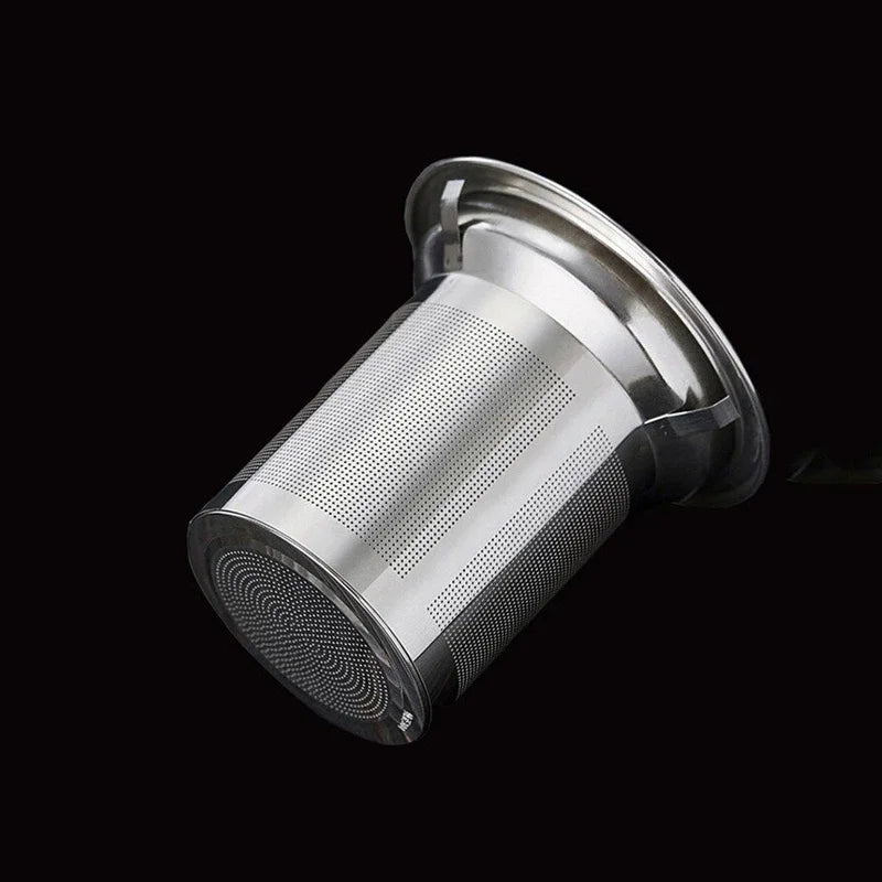 Tetera de vidrio transparente con infusor