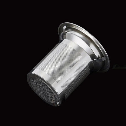 Tetera de vidrio transparente con infusor