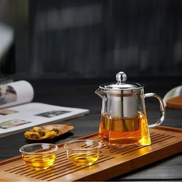 Tetera de vidrio transparente con infusor